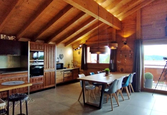Appartement à Les Carroz d'Arâches - 5 Pièces 8pers au coeur du village, LES CHALETS D'ELINE Parking souterrain,  2 balcons -ELI645