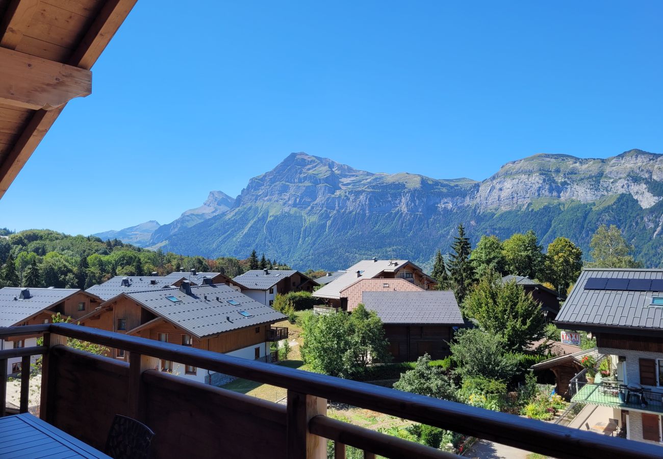 Appartement à Les Carroz d'Arâches - 5 Pièces 8pers au coeur du village, LES CHALETS D'ELINE Parking souterrain,  2 balcons -ELI645